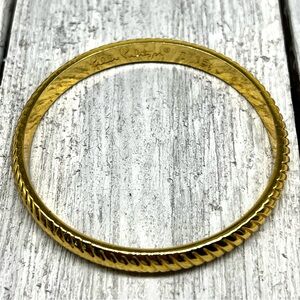 149. Signed Lilly Pulitzer gold tone bangle bracelet.